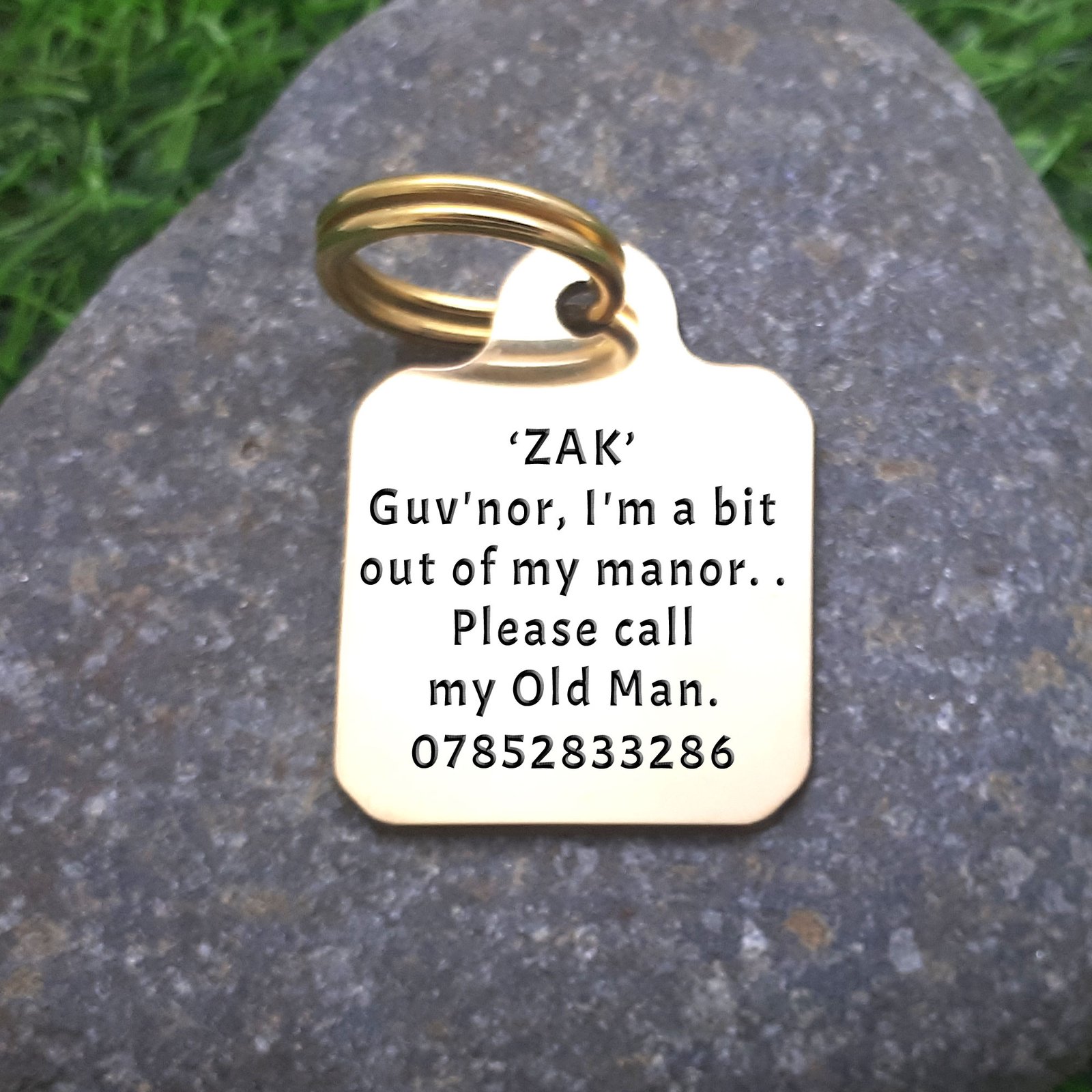Square shaped solid brass Pet ID Tag, nmade to last, lifetime engaring guarantee, engraved with name of pet, telephone number and a fun cockney theme phrase "Guv'nor, I'm a bit out of my manor. . Please call my Old Man."